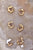 GOLD PLATED FEMININE WAVES HOOP EARRINGS W107 BRASS GOLD - Mulaner